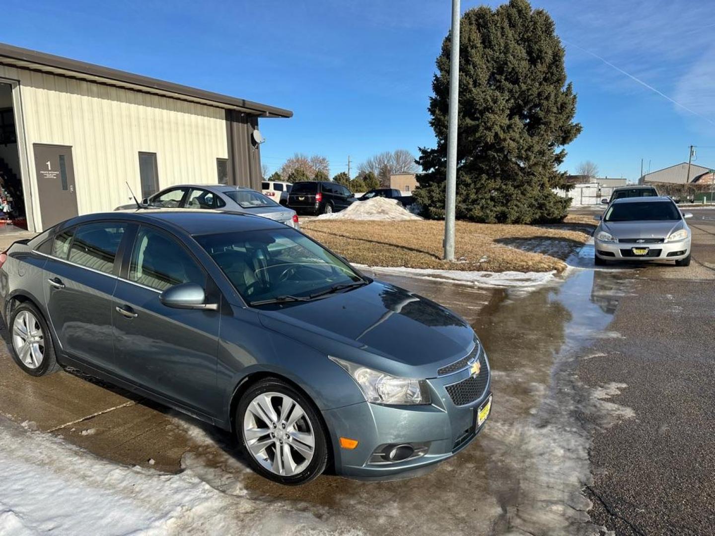 2012 BLUE CHEVROLET CRUZE LTZ (1G1PH5SC8C7) with an 1.4L engine, Automatic transmission, located at 1030 S. 22nd St., Bismarck, ND, 58504, (701) 258-0022, 46.793560, -100.758118 - Photo#2