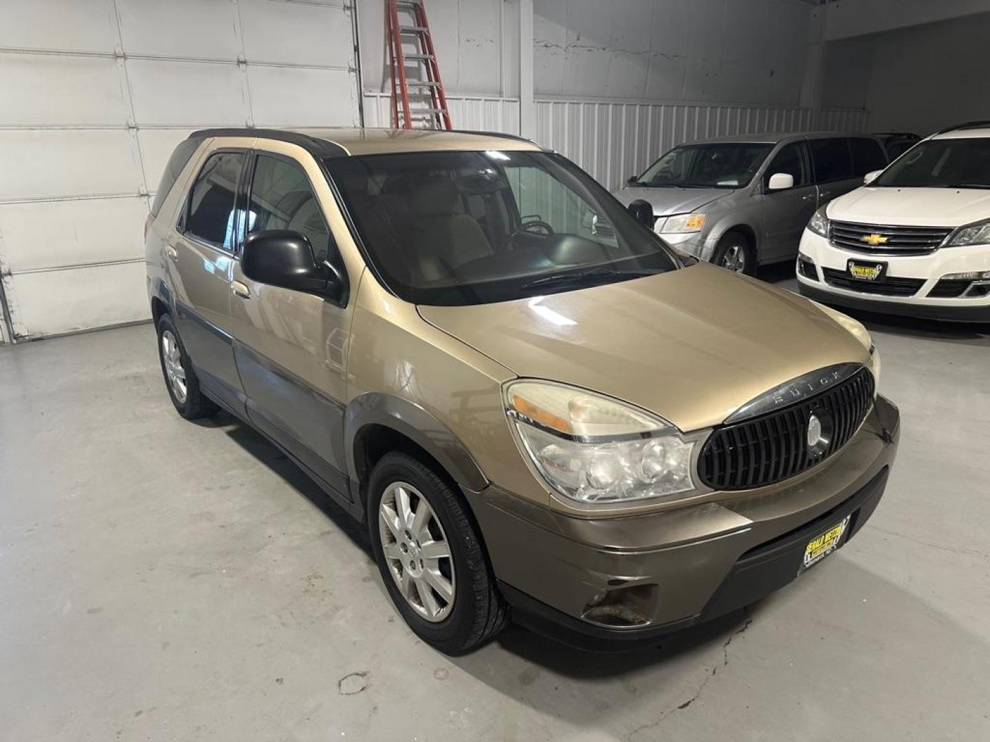 2005 BROWN BUICK RENDEZVOUS CX (3G5DB03EX5S) with an 3.4L engine, Automatic transmission, located at 1030 S. 22nd St., Bismarck, ND, 58504, (701) 258-0022, 46.793560, -100.758118 - Photo#2