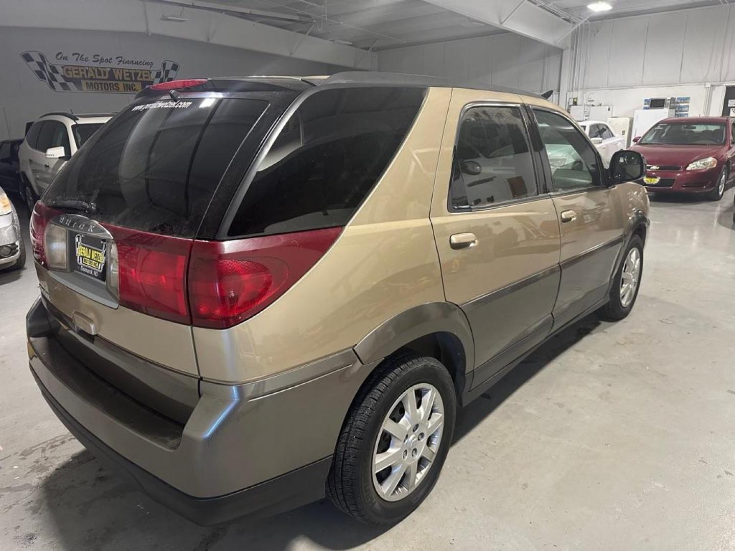 2005 BROWN BUICK RENDEZVOUS CX (3G5DB03EX5S) with an 3.4L engine, Automatic transmission, located at 1030 S. 22nd St., Bismarck, ND, 58504, (701) 258-0022, 46.793560, -100.758118 - Photo#3