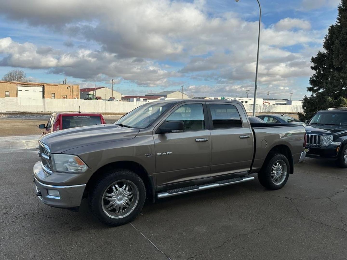 2009 DODGE RAM 1500 (1D3HV13T59S) with an 5.7L engine, Automatic transmission, located at 1030 S. 22nd St., Bismarck, ND, 58504, (701) 258-0022, 46.793560, -100.758118 - NICE CLEAN RAM 5.7 lITER - Photo#0