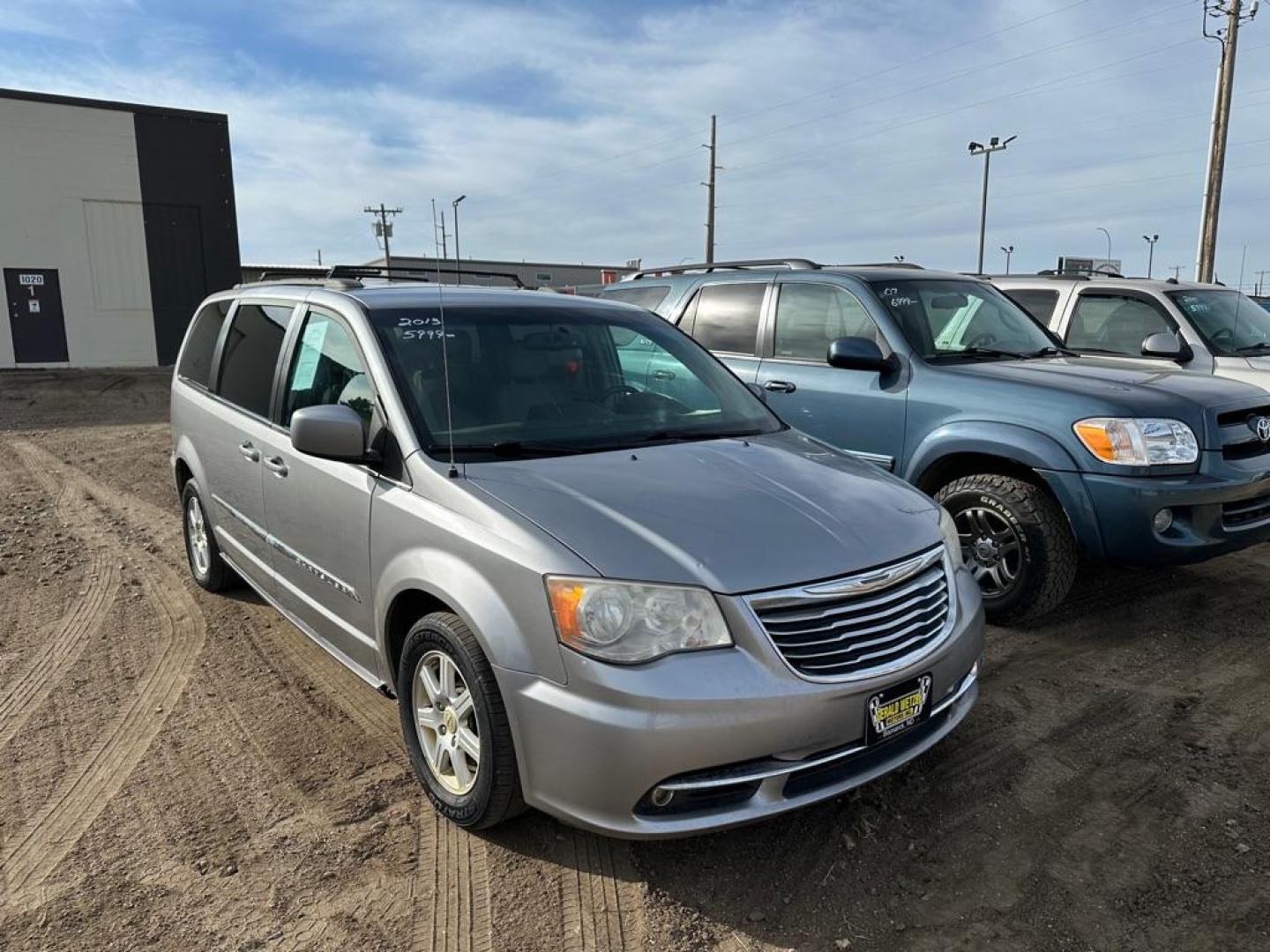 2013 SILVER CHRYSLER TOWN and COUNTRY TOURING (2C4RC1BG1DR) with an 3.6L engine, Automatic transmission, located at 1030 S. 22nd St., Bismarck, ND, 58504, (701) 258-0022, 46.793560, -100.758118 - Photo#1