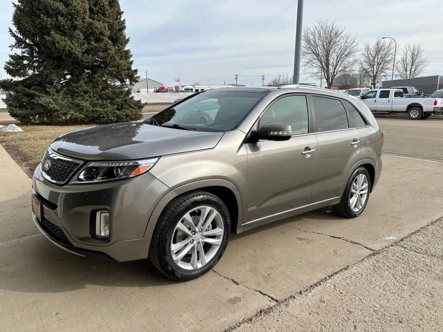 2014 BROWN /Grey KIA SORENTO SX (5XYKWDA73EG) with an 3.3L engine, Automatic transmission, located at 1030 S. 22nd St., Bismarck, ND, 58504, (701) 258-0022, 46.793560, -100.758118 - Photo#0