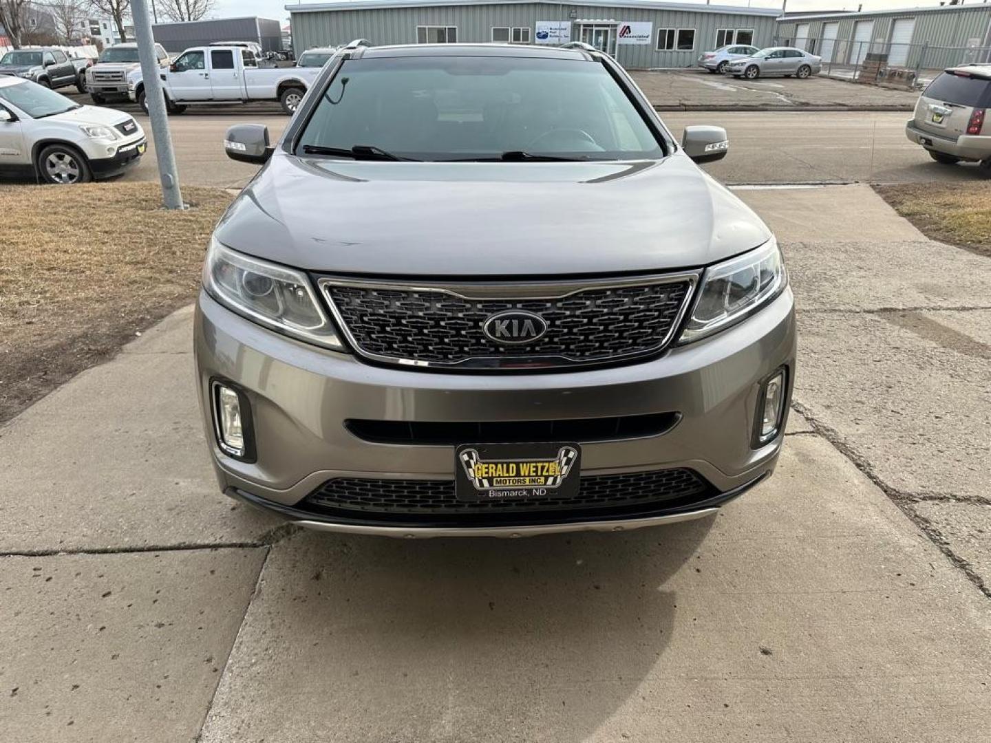 2014 BROWN /Grey KIA SORENTO SX (5XYKWDA73EG) with an 3.3L engine, Automatic transmission, located at 1030 S. 22nd St., Bismarck, ND, 58504, (701) 258-0022, 46.793560, -100.758118 - Photo#1